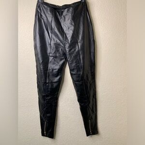 Black stretchy leather pants with gold zipper on ankle, size :M